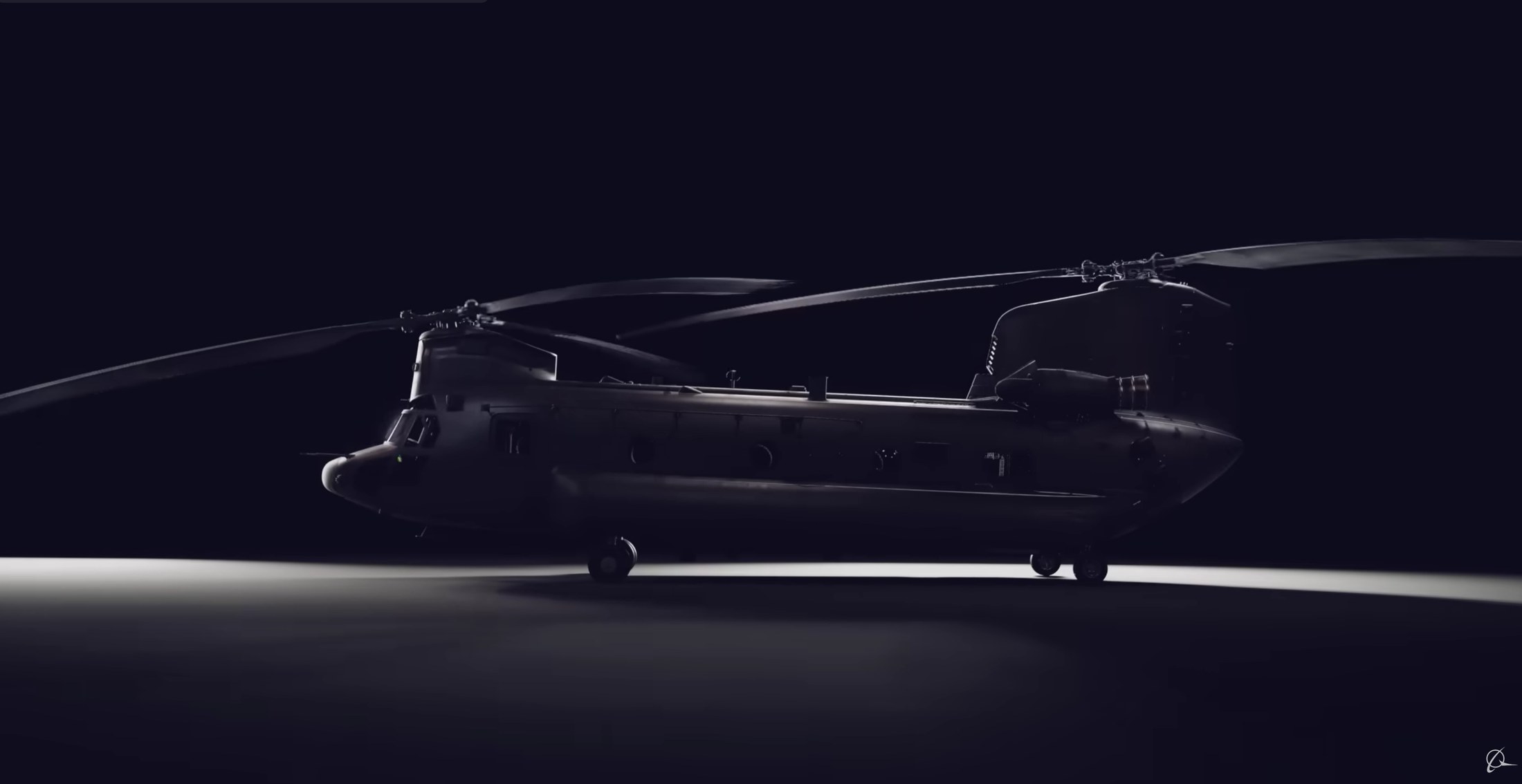 Chinook aircraft dramatically lit in a dark studio